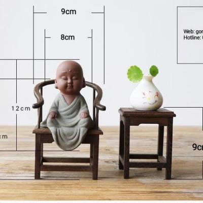 BỘ BÀN GHẾ GỖ KÈM TƯỢNG CHÚ TIỂU